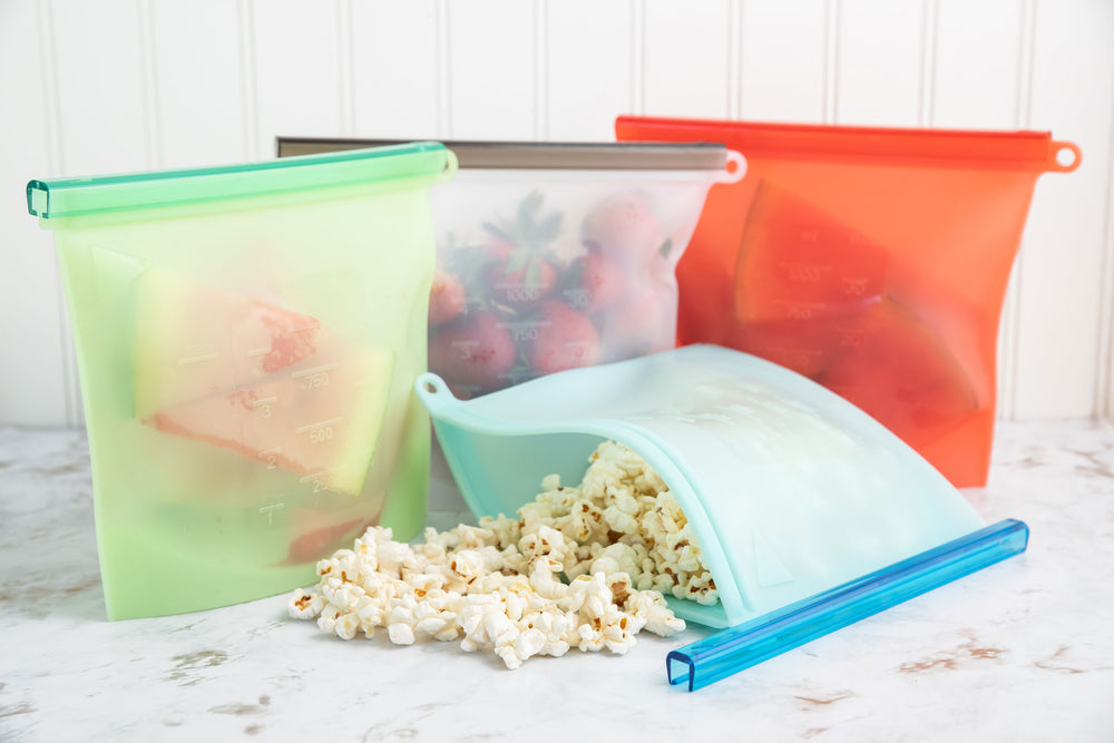 Silicone storage bags in four different colors. Great for storing fruit, snacks, leftovers, etc.