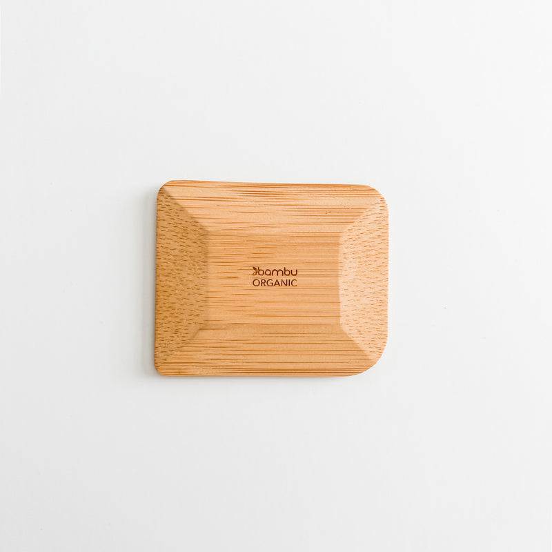 Kitchen bamboo scraper with 4 different corner shapes.
